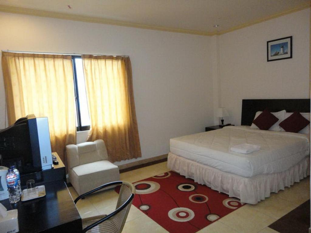 Grand Duta Hotel Palu Room photo